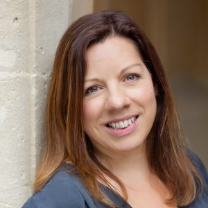 Rachel Fallon, founder of Facebook Ads consultancy, leaning against a wall